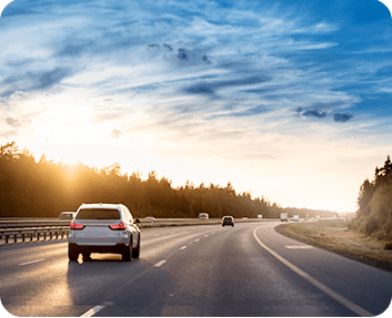 Image showing scenic road with car being driven