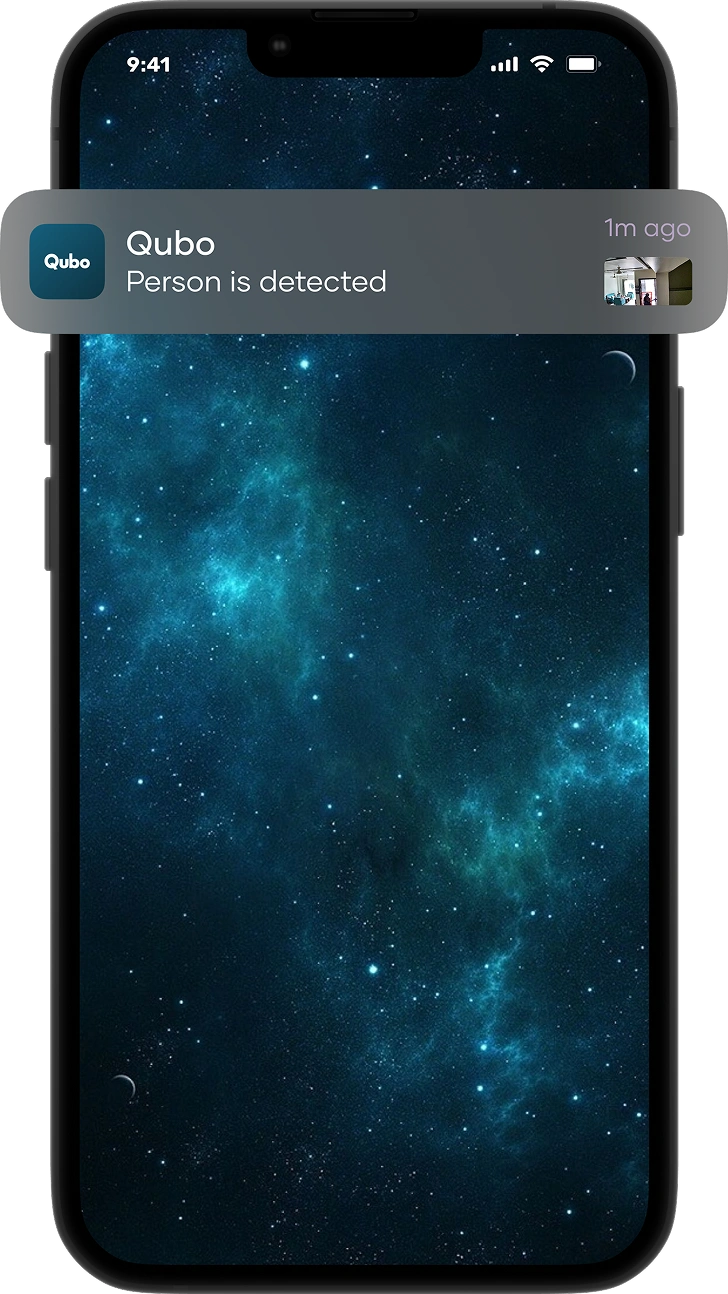 Image of a phone displaying a Qubo app alert