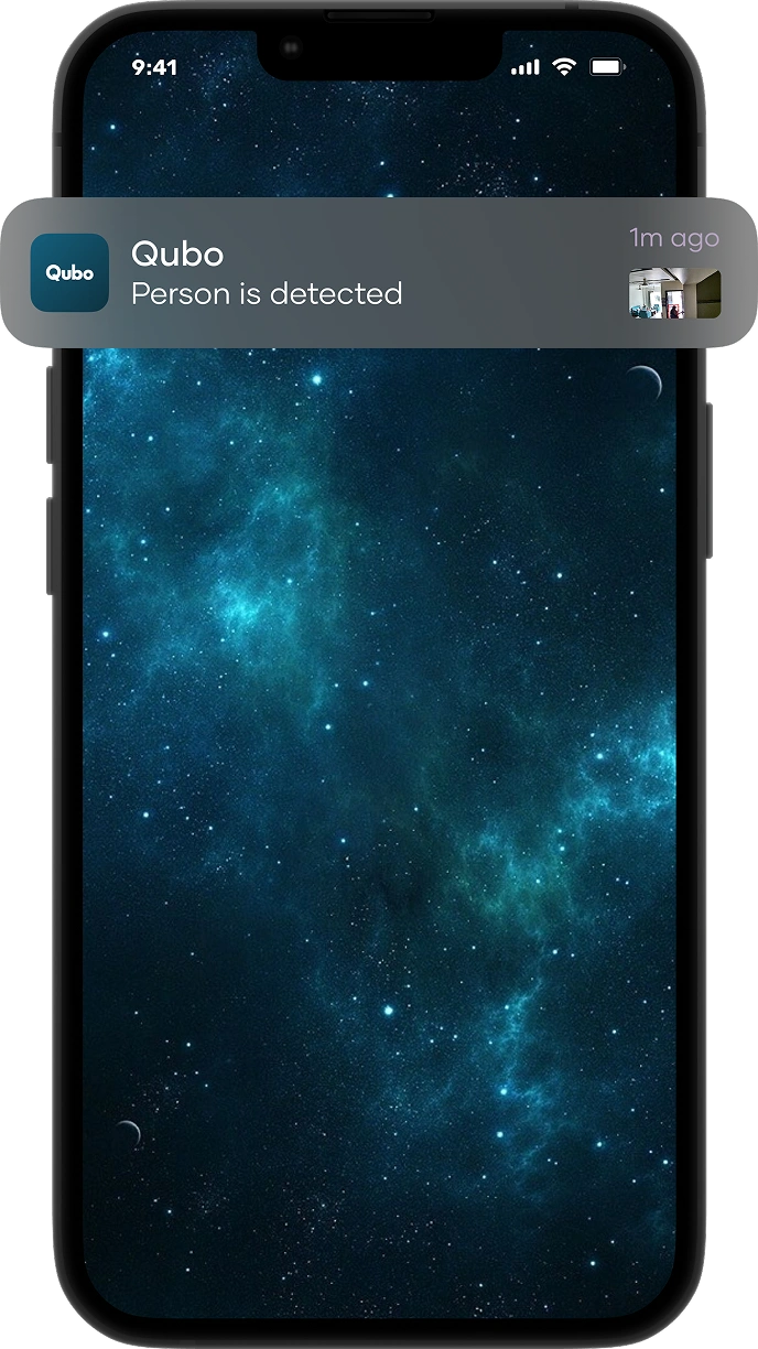 Image of a phone displaying a Qubo app alert